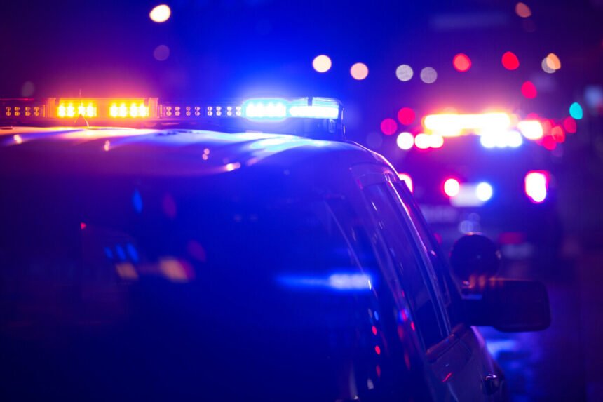 Murder suspect bails off overpass in front of semi truck