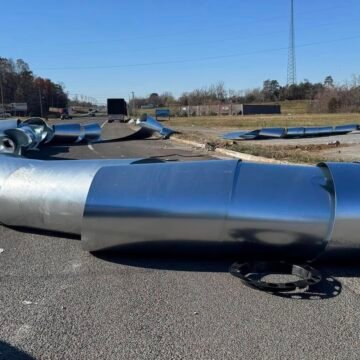Semi loses load of metal across Tennessee highway