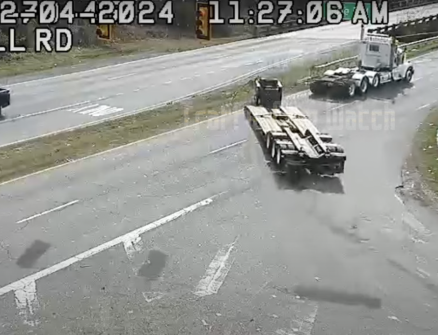 Traffic cams catch trucker losing trailer on turn