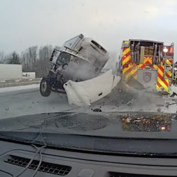Dash cam shows out-of-control box truck spinning and slamming into cop car, fire truck