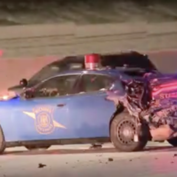 Driver trying to bypass traffic arrested after crashing into police cruisers
