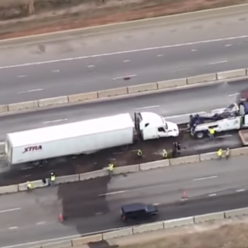 Oklahoma police officer falls off overpass while tending to semi truck crash
