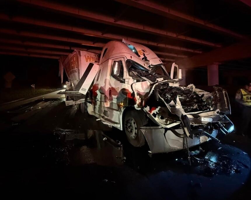 Semi truck smacks into suspended dump bed left behind by dump truck under bridge