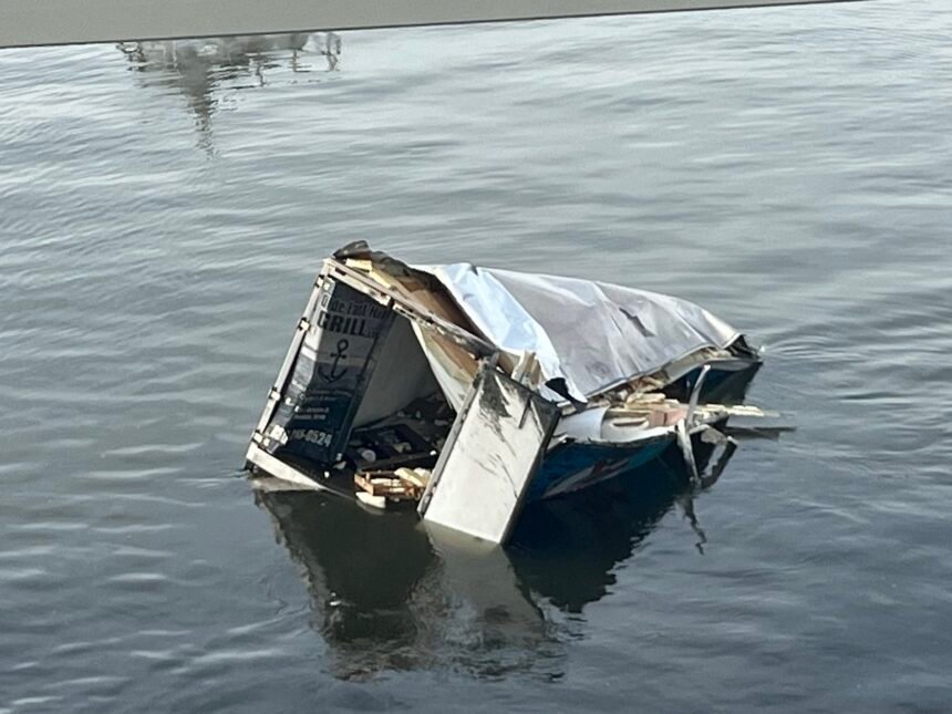 Chaos of Twin Span Bridge crash cleared as crews lift box truck out of water, determine no other vehicles involved