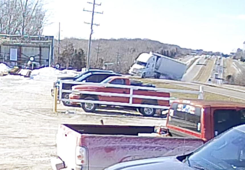 Driver survives wreck that left “engine in his lap” caught on surveillance video