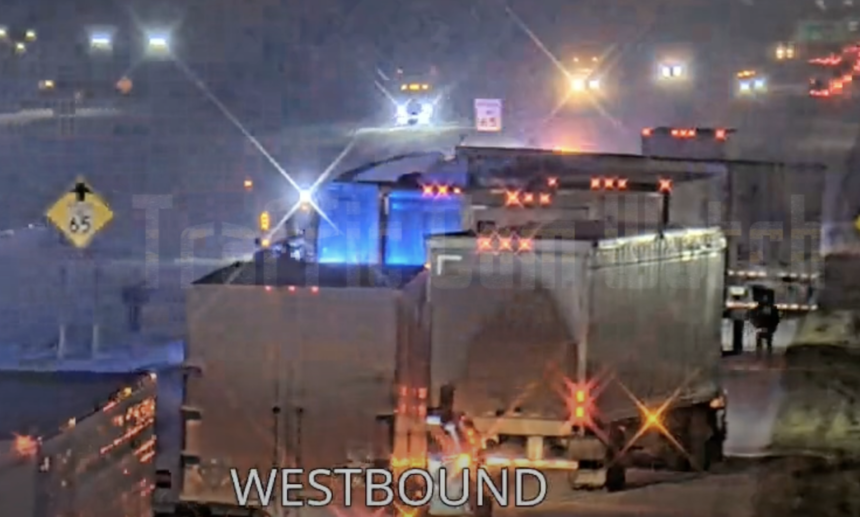 Watch this line of tractor trailers slowly pile up in slippery, slowed traffic