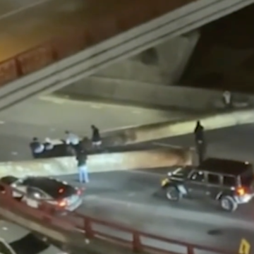 Two injured when large steel pipes roll off flatbed driving through Chicago